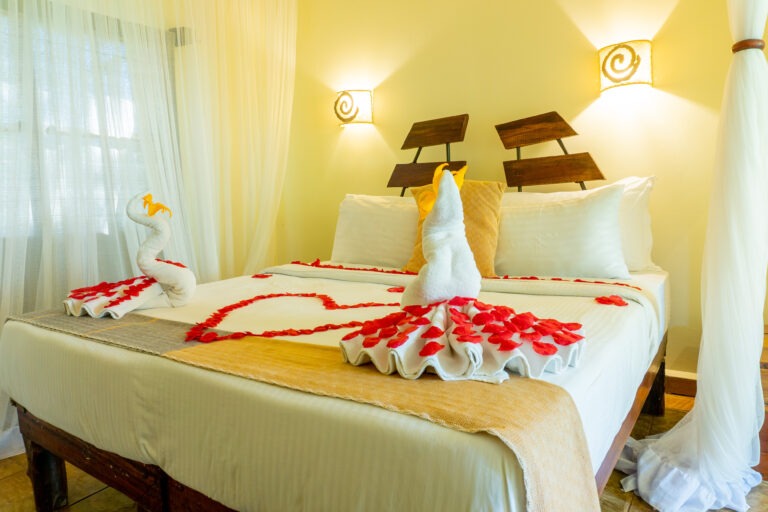 Honeymoon room decorated with rose petals at Weruweru River Lodge, Moshi Tanzania